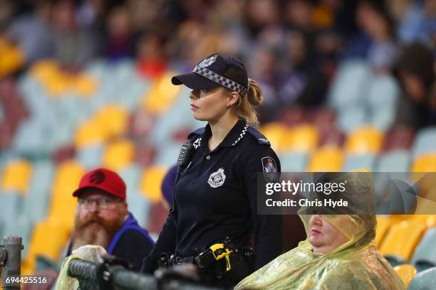 Police patrol the stadium during the round 12 AFL match between the Brisbane Lions and the Fremantle Dockers at The Gabba on June 10, 2017 in...