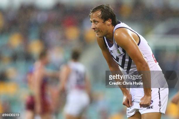 Cameron Sutcliffe of the Dockers looks on during the round 12 AFL match between the Brisbane Lions and the Fremantle Dockers at The Gabba on June 10,...