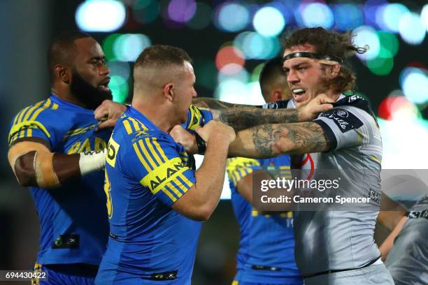 Nathan Brown of the Eels and Ethan Lowe of the Cowboys have an altercation during the round 14 NRL match between the Parramatta Eels and the North...