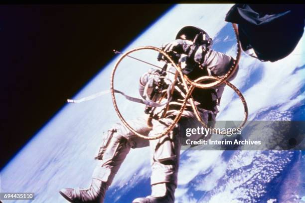 Astronaut Ed White II makes the first space walk during the Gemini 4 mission, June 3, 1965.