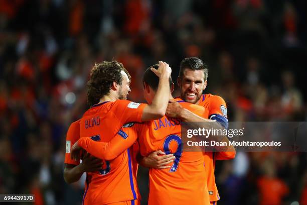 Vincent Janssen of the Netherlands celebrates scoring a goal with Jeremain Lens during the FIFA 2018 World Cup Qualifier between the Netherlands and...