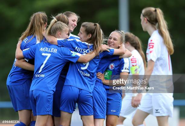 Marie Therese Hoebinger of Potsdam jubilates with team mates after scoring the fourth goal during the B Junior Girl's German Championship semi final...