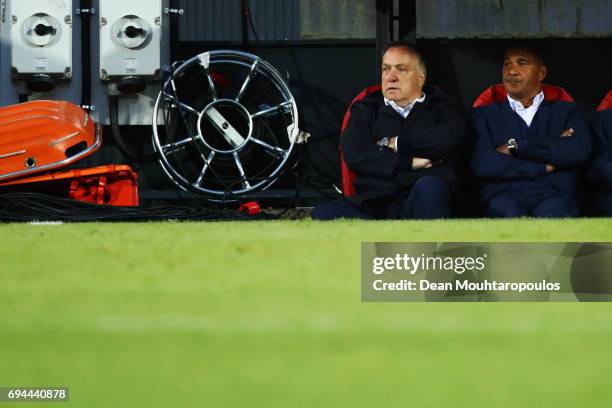 Netherlands Head Coach / Manager, Dick Advocaat and his assitant Ruud Gullit watch the team from the bench during the FIFA 2018 World Cup Qualifier...