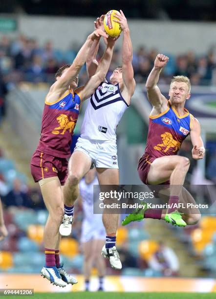 Lachie Neale of the Dockers takes a mark during the round 12 AFL match between the Brisbane Lions and the Fremantle Dockers at The Gabba on June 10,...