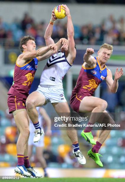 Lachie Neale of the Dockers takes a mark during the round 12 AFL match between the Brisbane Lions and the Fremantle Dockers at The Gabba on June 10,...