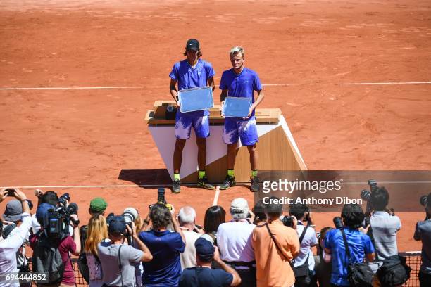Alexei Popyrin of Australia and Nicola Kuhn of Spain during the day 14 of the French Open at Roland Garros on June 10, 2017 in Paris, France.