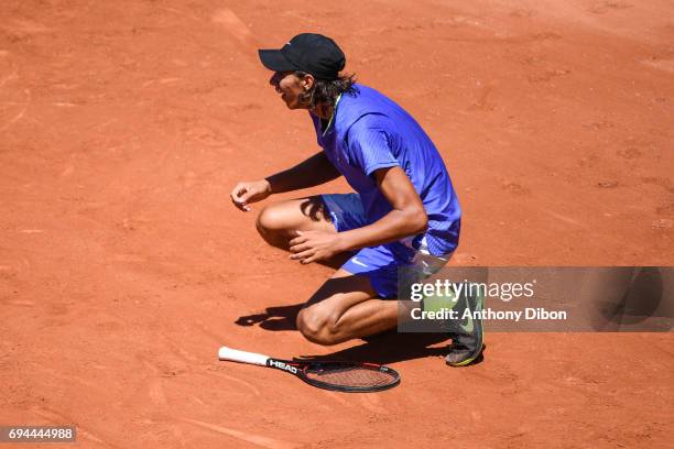 Alexei Popyrin of Australie celebrates his victory during the day 14 of the French Open at Roland Garros on June 10, 2017 in Paris, France.
