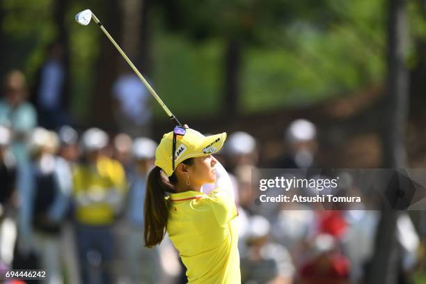 Ai Miyazato of Japan hits her tee shot on the 5th hole during the third round of the Suntory Ladies Open at the Rokko Kokusai Golf Club on June 10,...