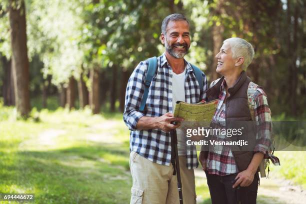 mature couple hiking - active seniors autumn stock pictures, royalty-free photos & images