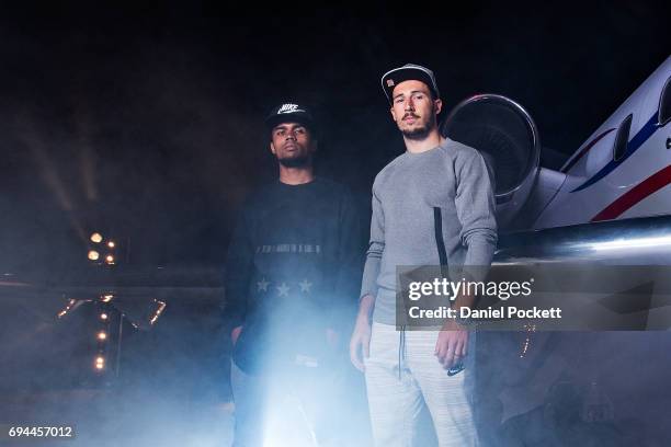 Douglas Costa of Brazil and Mathew Leckie of Australia pose for a photo during the Nike 'No Turning Back' Fan Meet & Greet at Hangar 85 on June 10,...
