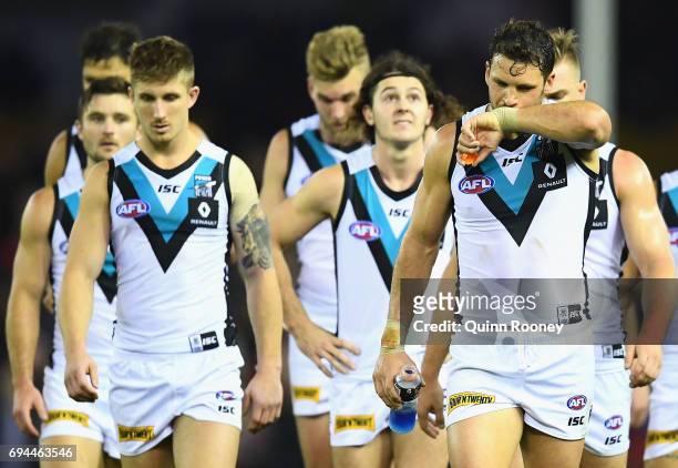 Travis Boak of the Power looks dejected after losing the round 12 AFL match between the Essendon Bombers and the Port Adelaide Power at Etihad...