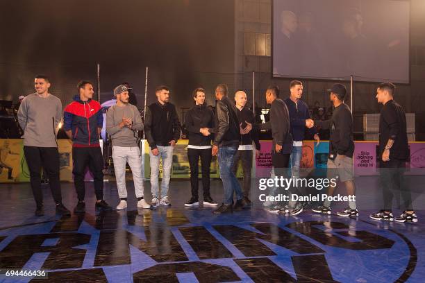 Players from Australia meet players from Brazil during the Nike 'No Turning Back' Fan Meet & Greet at Hangar 85 on June 10, 2017 in Melbourne,...
