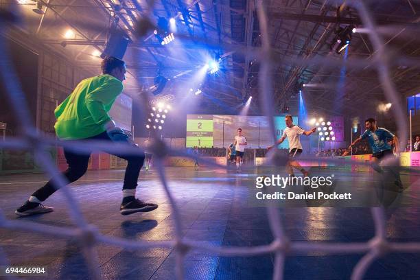 Players compete in a Futsal tournament during the Nike 'No Turning Back' Fan Meet & Greet at Hangar 85 on June 10, 2017 in Melbourne, Australia.