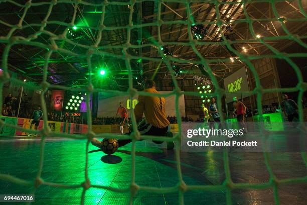 Players compete in a Futsal tournament during the Nike 'No Turning Back' Fan Meet & Greet at Hangar 85 on June 10, 2017 in Melbourne, Australia.