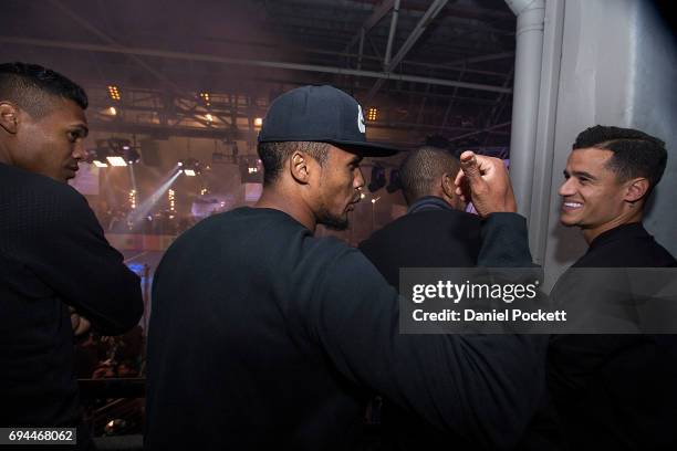 Douglas Costa of Brazil, Alex Sandro of Brazil, Fernandinho of Brazil and Philippe Coutinho of Brazil watch the Futsal tournament during the Nike 'No...