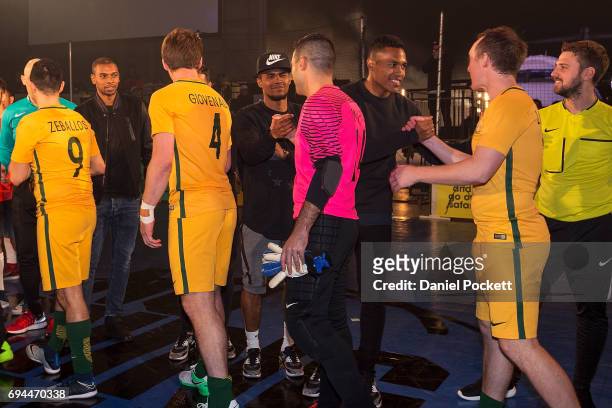 Fernandinho of Brazil, Alex Sandro of Brazil and Douglas Costa of Brazil meet Futsal players during the Nike 'No Turning Back' Fan Meet & Greet at...