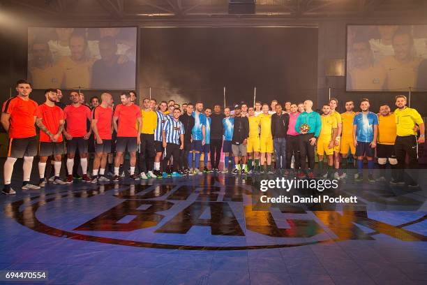 Players from Brazil and Australia pose for a photo with Futsal players during the Nike 'No Turning Back' Fan Meet & Greet at Hangar 85 on June 10,...