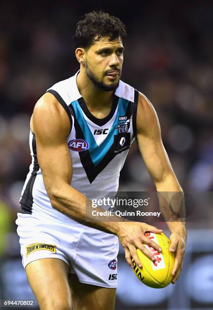 Patrick Ryder of the Power kicks during the round 12 AFL match between the Essendon Bombers and the Port Adelaide Power at Etihad Stadium on June 10,...