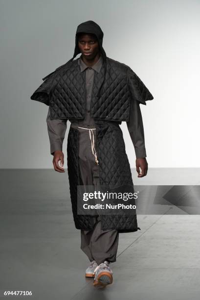 Model walks the runway at the Liam Hodges show during the London Fashion Week Men's June 2017 collections on June 9, 2017 in London, England.