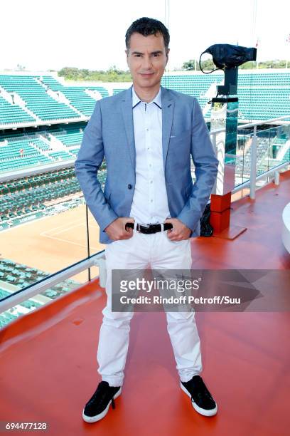 Sports Journalist Laurent Luyat poses at France Television french chanel studio during the Women Final of the 2017 French Tennis Open - Day Fourteen...