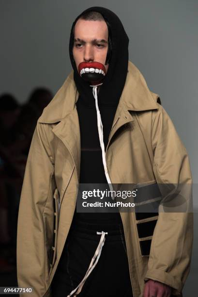 Model walks the runway at the Liam Hodges show during the London Fashion Week Men's June 2017 collections on June 9, 2017 in London, England.