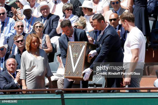 Boxing Olympic Champion Estelle Mossely and Actor Alexander Skarsgard present the Suzanne-Lenglen's Cup and his Louis Vuitton trunk before the Women...