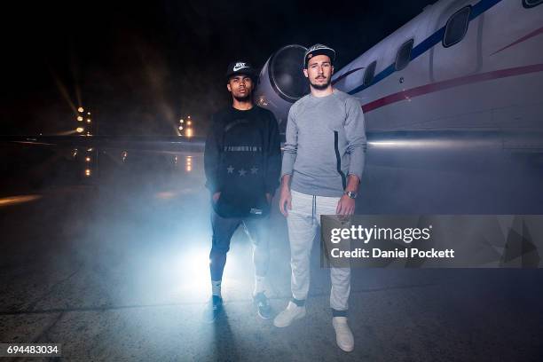 Douglas Costa of Brazil and Mathew Leckie of Australia pose for a photo during the Nike 'No Turning Back' Fan Meet & Greet at Hangar 85 on June 10,...