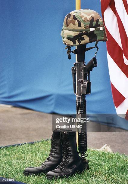 Memorial for marine Cpl. Sean Patrick Tallon, who died at the World Trade Center in his duties as an NYC firefighter, is adorned with an M-16A2...