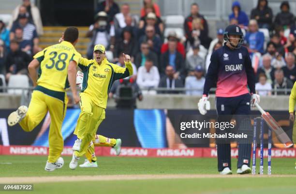 Steve Smith of Australia celebrates after Josh Hazlewood captures the wicket of Joe Root of England during the ICC Champions Trophy match between...