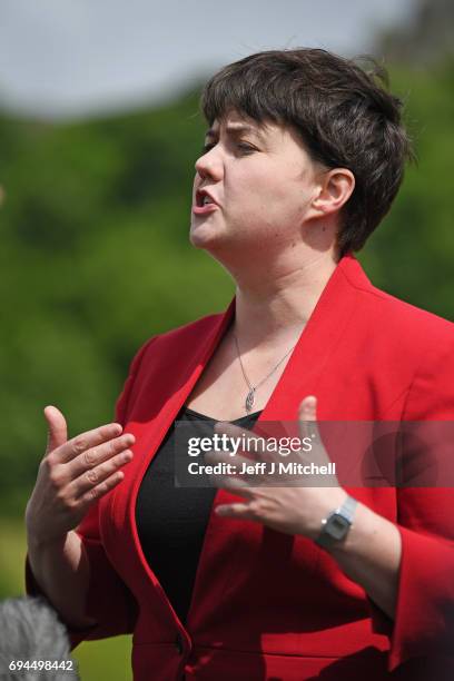 Scottish Conservative leader Ruth Davidson talks with the media following meeting with her newly elected members of parliament with the backdrop of...