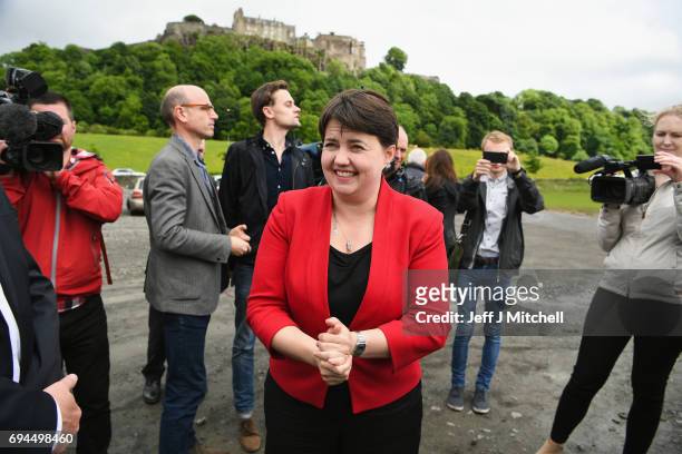Scottish Conservative leader Ruth Davidson talks with the media following meeting with her newly elected members of parliament with the backdrop of...