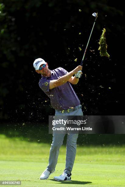 Bernd Wiesberger of Austria plays his second shot into the third green during the third roud of the Lyoness Open at Diamond Country Club on June 10,...