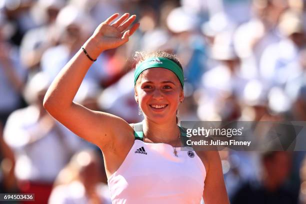 Jelena Ostapenko of Latvia celebrates victory during the ladies singles final against Simona Halep of Romania on day fourteen of the 2017 French Open...