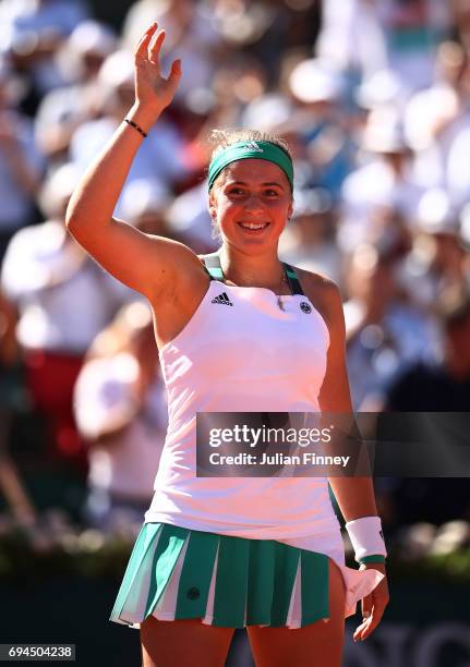 Jelena Ostapenko of Latvia celebrates victory during the ladies singles final against Simona Halep of Romania on day fourteen of the 2017 French Open...