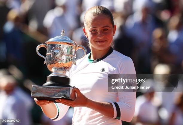 Jelena Ostapenko of Latvia poses with the Suzanne Lenglen Cup following her victory during the ladies singles final against Simona Halep of Romania...