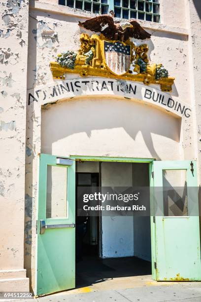 front doors to the administration building at the entrance to alcatraz prison. - alcatraz island stock pictures, royalty-free photos & images