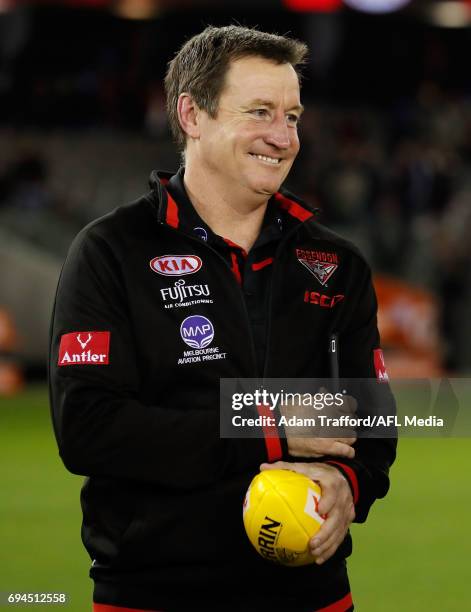 John Worsfold, Senior Coach of the Bombers celebrates with his players during the 2017 AFL round 12 match between the Essendon Bombers and the Port...