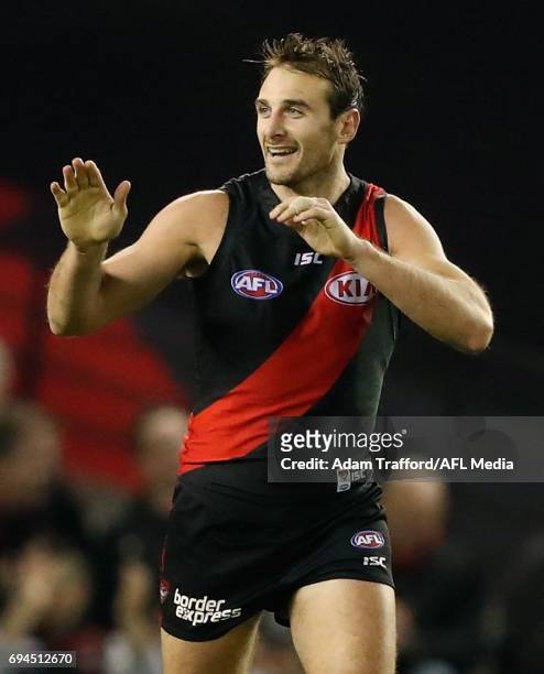 Jobe Watson of the Bombers celebrates his first goal since returning to AFL with teammates during the 2017 AFL round 12 match between the Essendon...