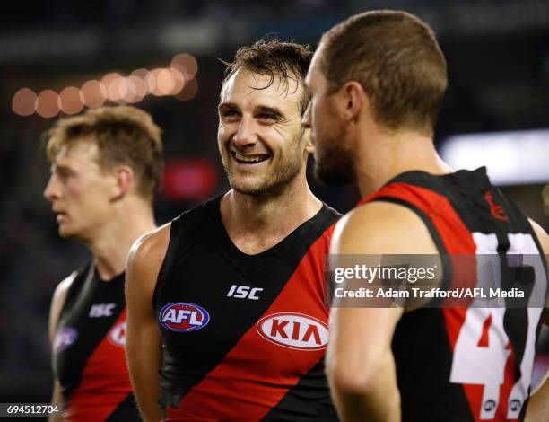 Jobe Watson of the Bombers celebrates with James Kelly of the Bombers during the 2017 AFL round 12 match between the Essendon Bombers and the Port...