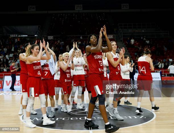 Players of Turkey Women's National Basketball team celebrate after winning against Latvia during a friendly match within the preparations of 2018...