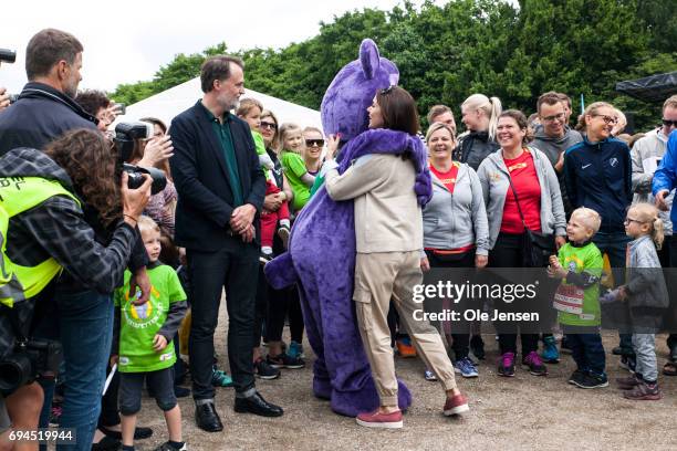 Crown Princess Mary of Denmark arrives to the 'Children's Relay Run' in Faelledparken on June 10, 2017 in Copenhagen, Denmark. The kids relay run is...