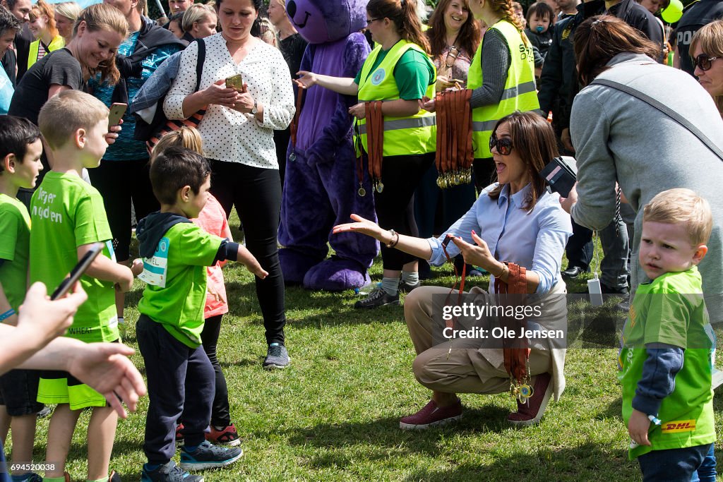 Crown Princess Mary Presents Medals At Relay Event For Kids In Copenhagen