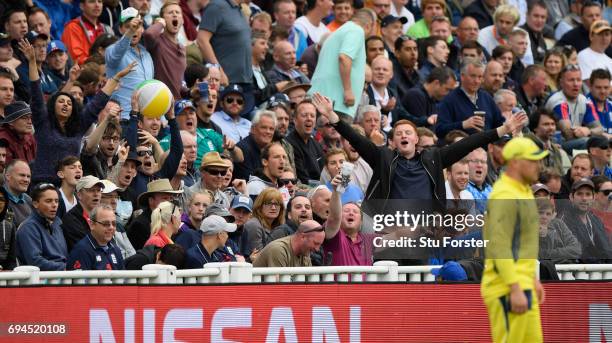 Fans enjoy some banter with Aaron Finch during the ICC Champions Trophy match between England and Australia at Edgbaston on June 10, 2017 in...