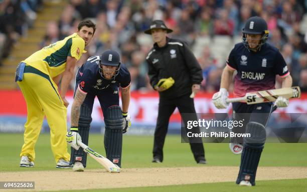 Ben Stokes of England watches as team-mate Eoin Morgan is run out as Mitchell Starc looks on during the ICC Champions Trophy match between England...