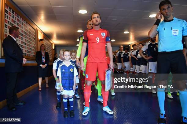 Harry Kane of England prepares to lead his team out prior to the FIFA 2018 World Cup Qualifier between Scotland and England at Hampden Park National...