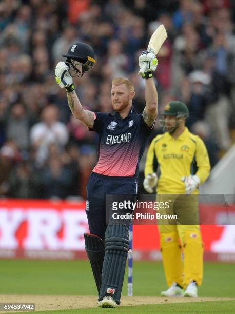 Ben Stokes of England celebrates reaching his century watched by Matthew Wade of Australia during the ICC Champions Trophy match between England and...