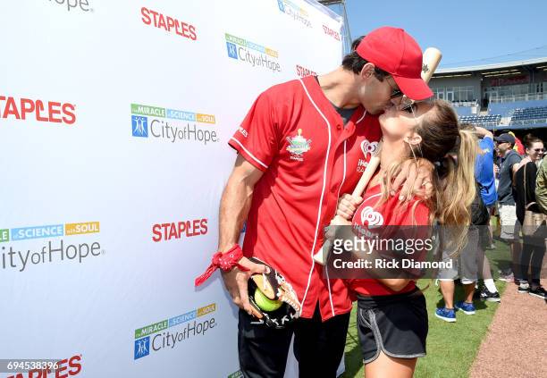 Wide Reciever Eric Decker and singer-songwriter Jessie James Decker arrive at the 27th Annual City of Hope Celebrity Softball Game at First Tennessee...