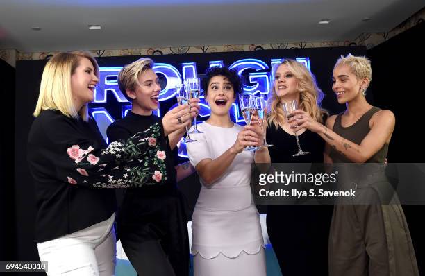 Actors Jillian Bell, Scarlett Johansson, Ilana Glazer, Kate McKinnon and Zoe Kravitz make a toast during "Rough Night" Photo Call at Crosby Street...
