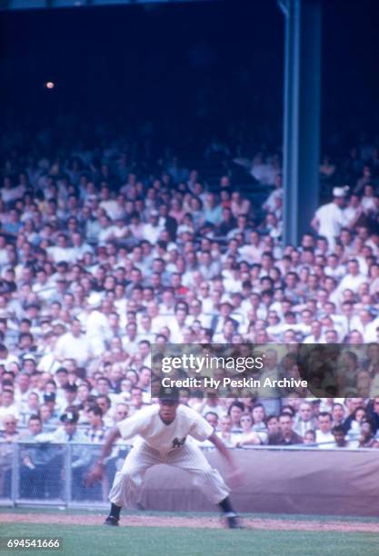 Elston Howard of the New York Yankees leads off first base during an MLB game against the Chicago White Sox on June 19, 1955 at Yankee Stadium in the...