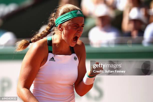 Jelena Ostapenko of Latvia celebrates a point during the ladies singles final match against Simona Halep of Romania on day fourteen of the 2017...